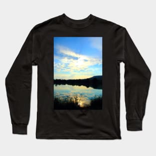 Mystical view with vegetation in the foreground, indistinct waters, Marche hills and azure sky Long Sleeve T-Shirt